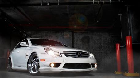 Sleek White Mercedes in Urban Setting wallpaper