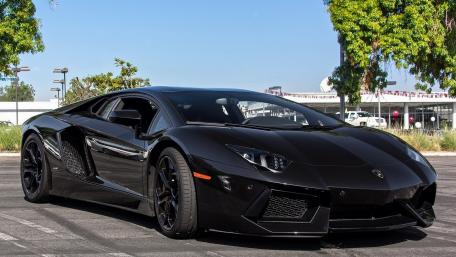Sleek Black Lamborghini Aventador Dreams Come True wallpaper