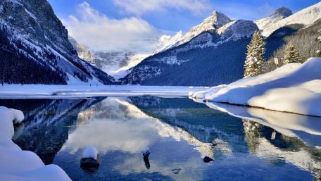 Serene Winter Reflections in a Mountain Lake wallpaper