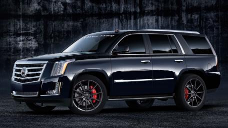 Sleek Black Cadillac Escalade Wallpaper wallpaper