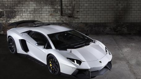 Sleek White Lamborghini Aventador in Urban Setting wallpaper