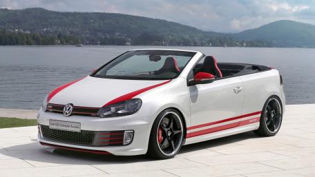 Sleek Volkswagen Cabrio by the Water wallpaper