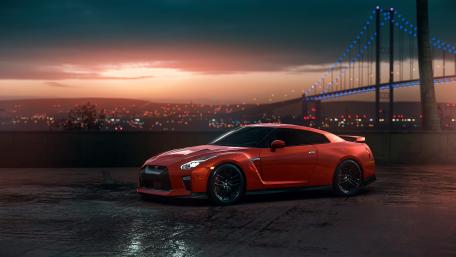 Iconic Red Nissan GT-R at Dusk under City Lights wallpaper