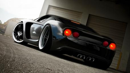 Sleek Black Ford GT in Urban Setting wallpaper