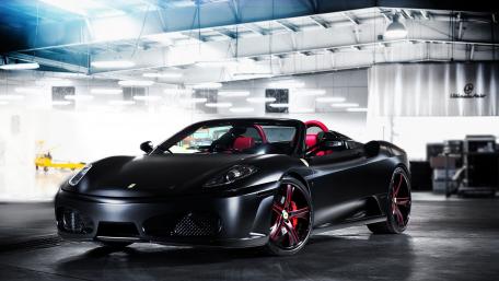 Sleek Ferrari F430 Spider in a Modern Garage Scene wallpaper