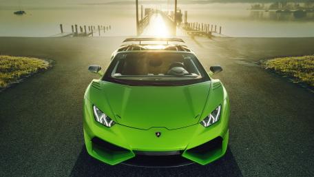 Vivid Green Lamborghini Huracan Under Sunrise Glow wallpaper