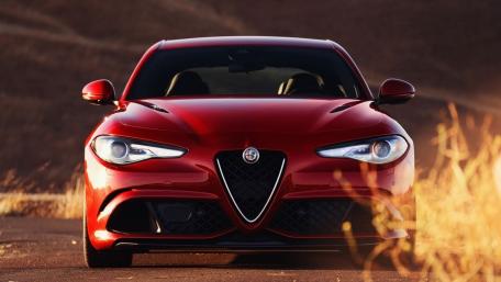 Sleek Alfa Romeo Giulia in Sunset Glow wallpaper
