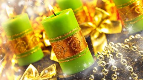 Festive Green Candles for Christmas Cheer wallpaper