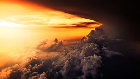 Majestic Sunset Over Clouds wallpaper