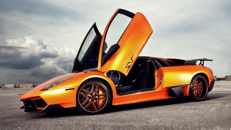 Stunning Lamborghini Murciélago in Vibrant Orange Shade wallpaper