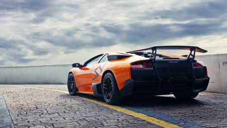Lamborghini Murciélago on Cobblestone Pathway wallpaper