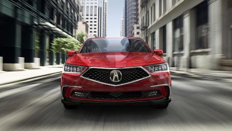 Sleek Acura RLX in Urban Motion wallpaper