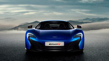 Sleek McLaren 650S in Stunning Scenic Backdrop wallpaper