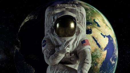 Astronaut's Journey: Earth from Space Perspective wallpaper
