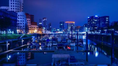 Twilight Marina in the Urban Glow wallpaper