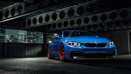 Dynamic BMW in Urban Night Setting wallpaper