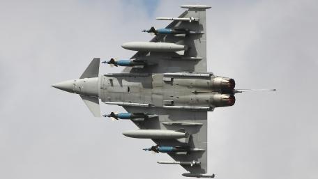 Sleek Fighter Aircraft in Action wallpaper