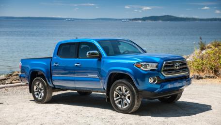 Blue Toyota Tacoma Pickup Truck by the Water wallpaper