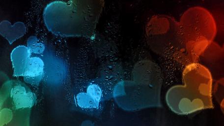 Heartfelt Raindrops Behind a Window wallpaper