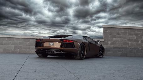 Sleek Lamborghini Aventador in Dramatic Setting wallpaper