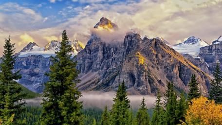 Majestic Mountains Under a Colorful Sky wallpaper