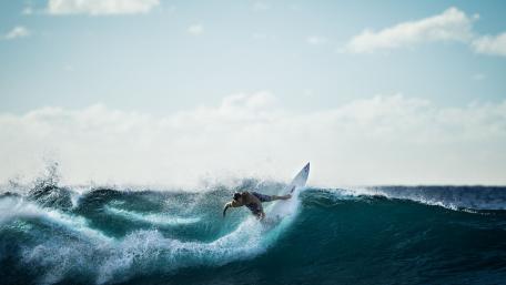 Surfing Adventure on Crystal Waves wallpaper