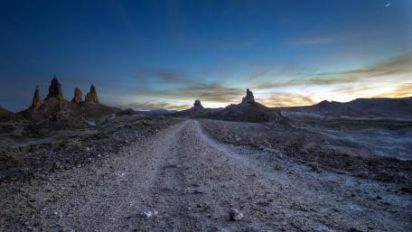 Winding Path Through Desert Peaks wallpaper