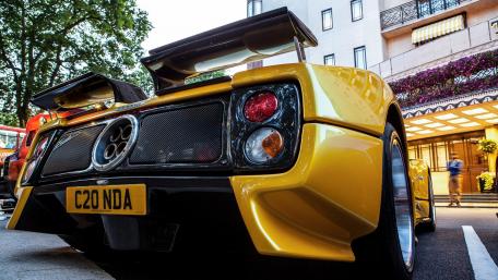 Vibrant Supercar in Urban Setting wallpaper