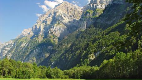 Majestic Mountain Landscape with Lush Greenery wallpaper