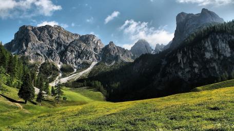 Majestic Mountain Landscape Under Blue Sky wallpaper