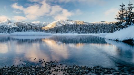 Serene Winter Landscape with Reflections in Water wallpaper