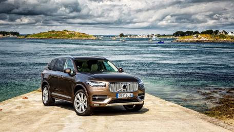 Elegant Volvo XC90 by the Serene Waterfront wallpaper