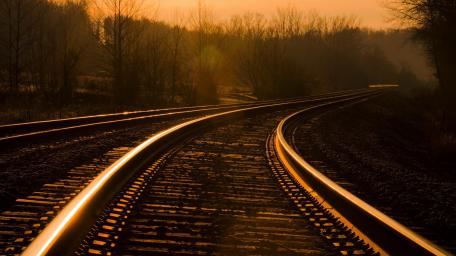 Curved Railway Tracks at Sunset wallpaper