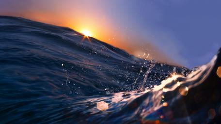Serene Sunset Over Ocean Waves wallpaper