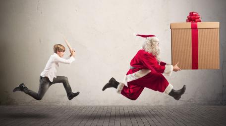 Santa on the Run from a Mischievous Kid wallpaper