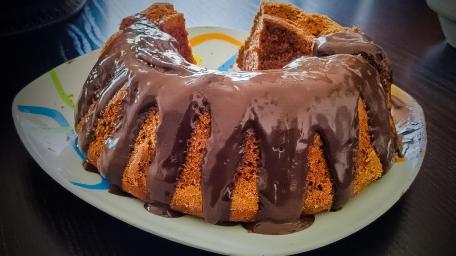 Delicious Chocolate Drizzled Bundt Cake Wallpaper wallpaper