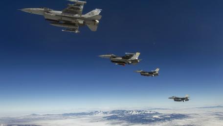 Powerful Military Aircraft in Formation Flight wallpaper
