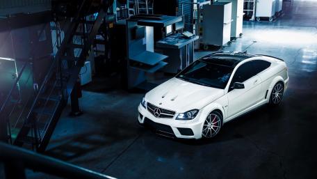 Sleek Mercedes-Benz in Industrial Setting wallpaper