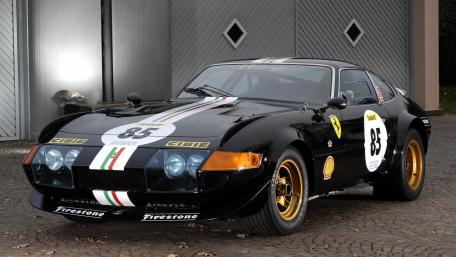 Classic Ferrari 365 in Striking Black Finish wallpaper