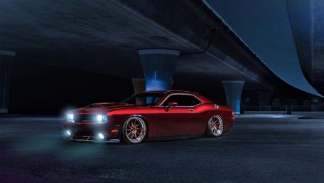 Sleek Dodge Challenger Under Night Sky wallpaper