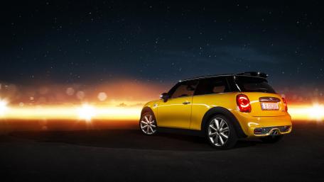 Stylish MINI Cooper Against a Starry Sky wallpaper