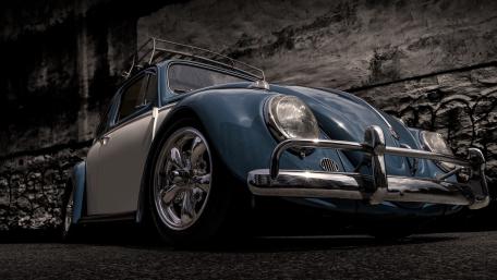 Classic Volkswagen Beetle in Striking Blue Hue wallpaper