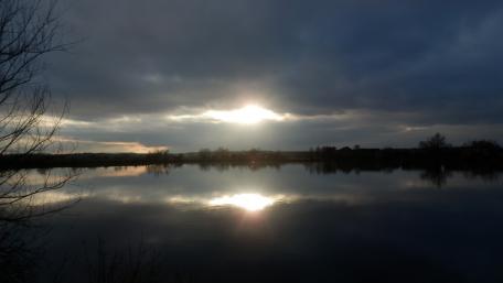 Serene Sunset Over Calm Waters wallpaper