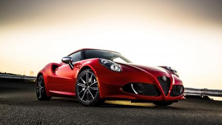 Sleek Red Alfa Romeo Sports Car Wallpaper wallpaper
