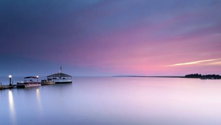 Serene Pier Under a Colorful Sky wallpaper