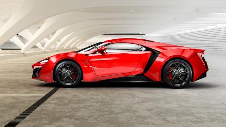 Red W Motors Lykan HyperSport in Sleek Setting wallpaper