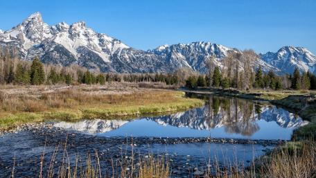 Majestic Mountains and Serene Reflections wallpaper