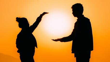 Sunlit Silhouettes Expressing Connection and Youthful Energy wallpaper