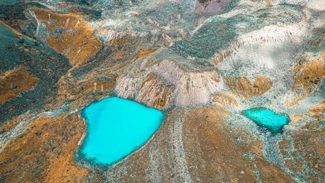 Serene Mountain Lakes in Vibrant Blue Shades wallpaper