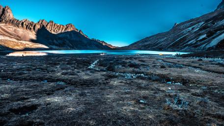Serene Valley Under a Blue Sky wallpaper